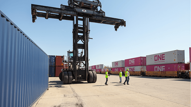 Alternative fuel reach stacker moving containers for carbon management