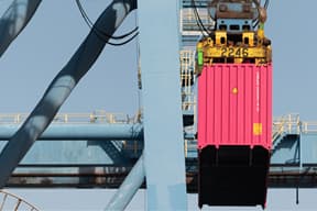 Supply chain crane loading container at shipping terminal